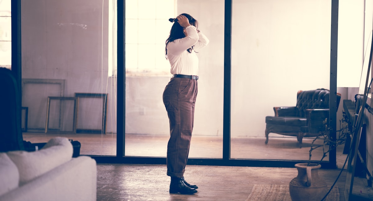 Person practicing proper posture stretch